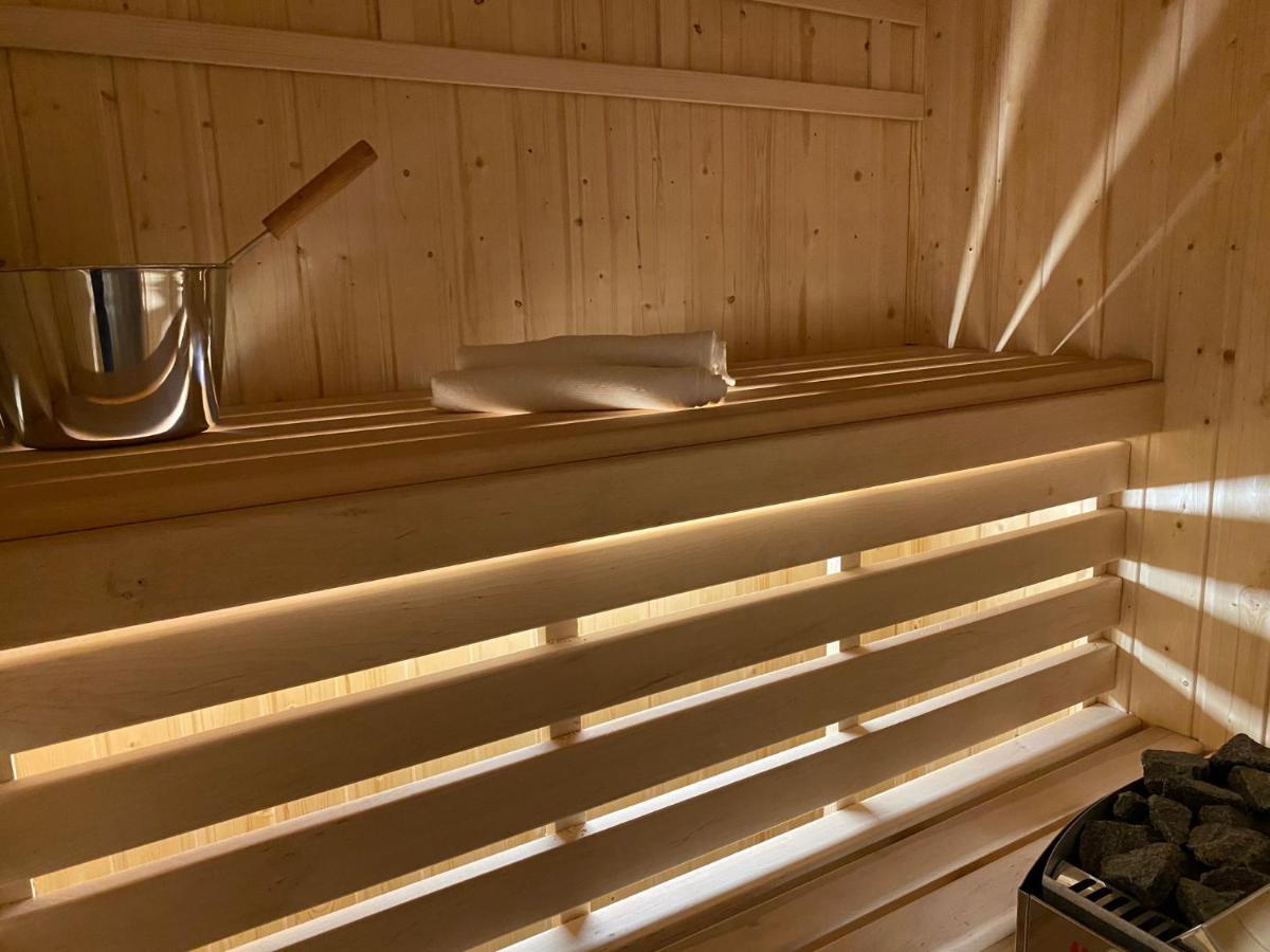 Family Sauna Apartments: Downtown Comfort With Private Wellness